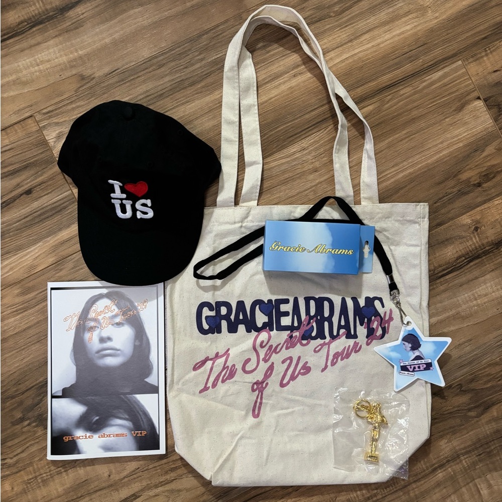 Gracie Abram’s VIP merch. The secret of us tour tote and hat
